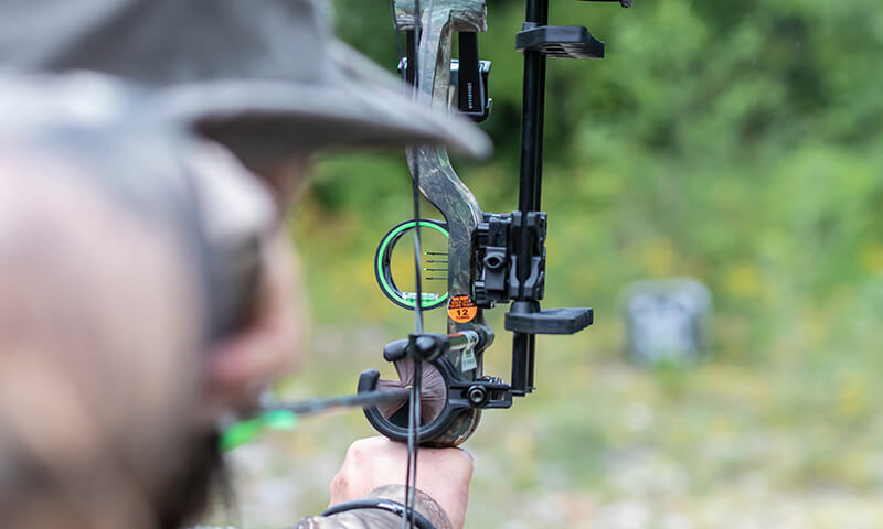 Aiming A Compound Bow With A Sight 